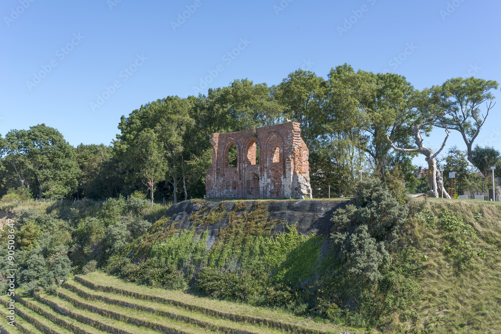 Ruins of gothic church from 14/15th century located in Trzesacz near the Baltic Sea. Currently, remained only fragment of southern wall. Trzesacz village, Poland, Europe.