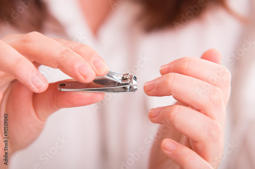 Cutting nails using nail clipper