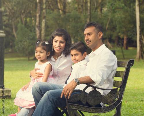 indian family enjoying quality time at outdoor park