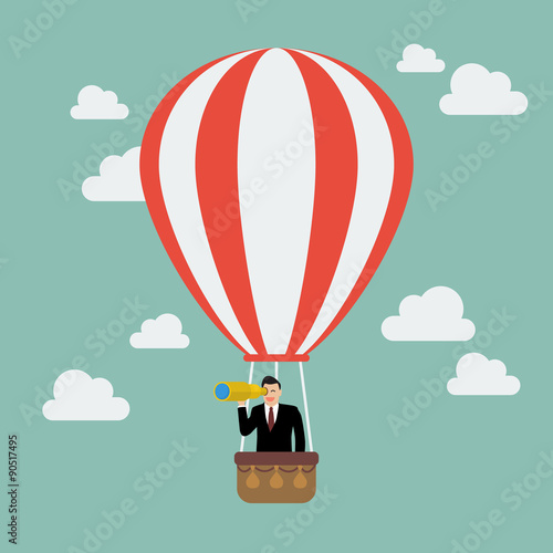 Businessman in hot air balloon search to success