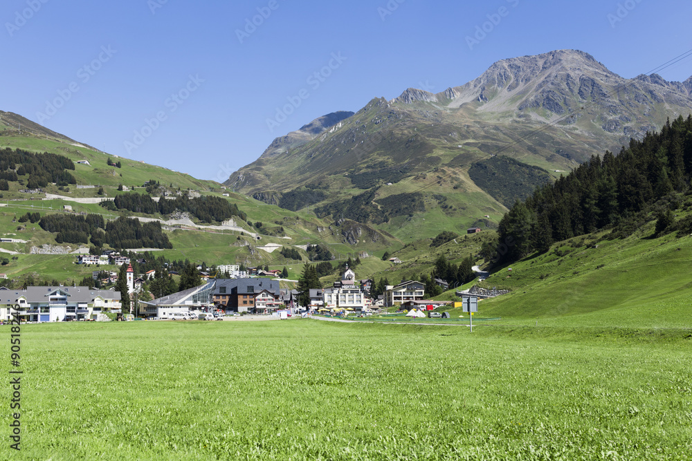 beautiful switzerland background with grass and typical houses