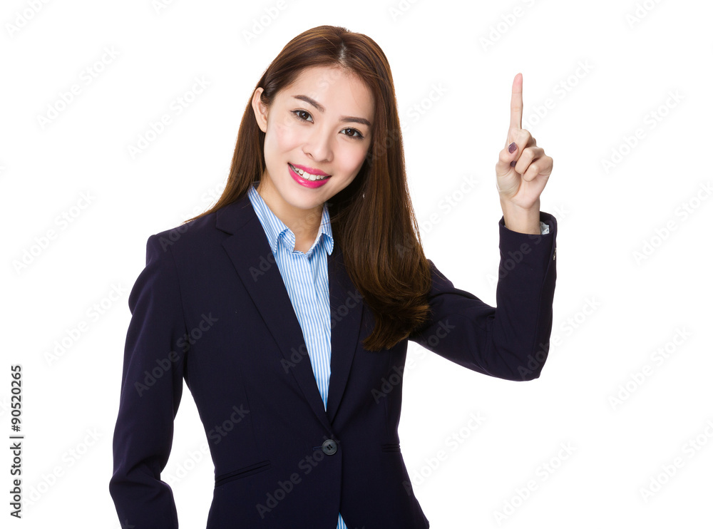 Young businesswoman with finger point up Young businesswoman with finger point up