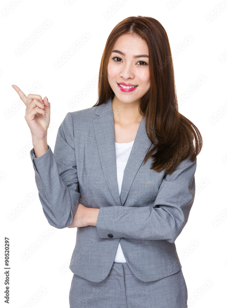 Young businesswoman with finger point up Young businesswoman with finger point up