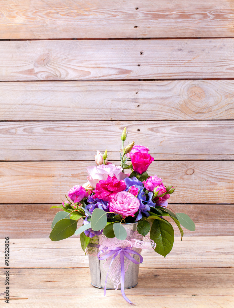 flowers. bouquet of roses on a wooden background flowers. bouquet of roses on a wooden background