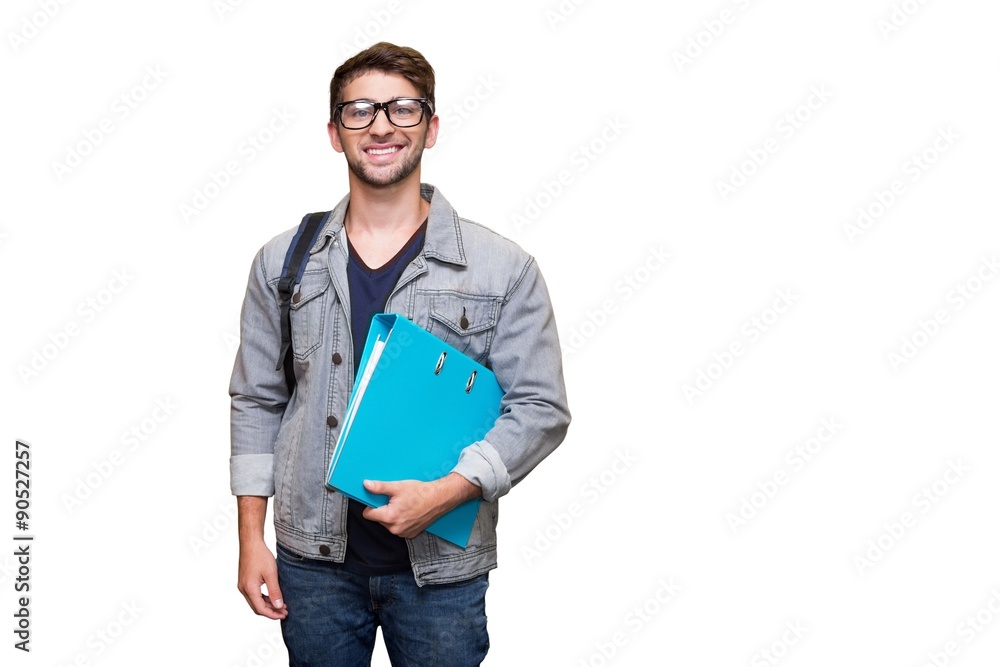 Composite image of student smiling at camera in library Composite image of student smiling at camera in library