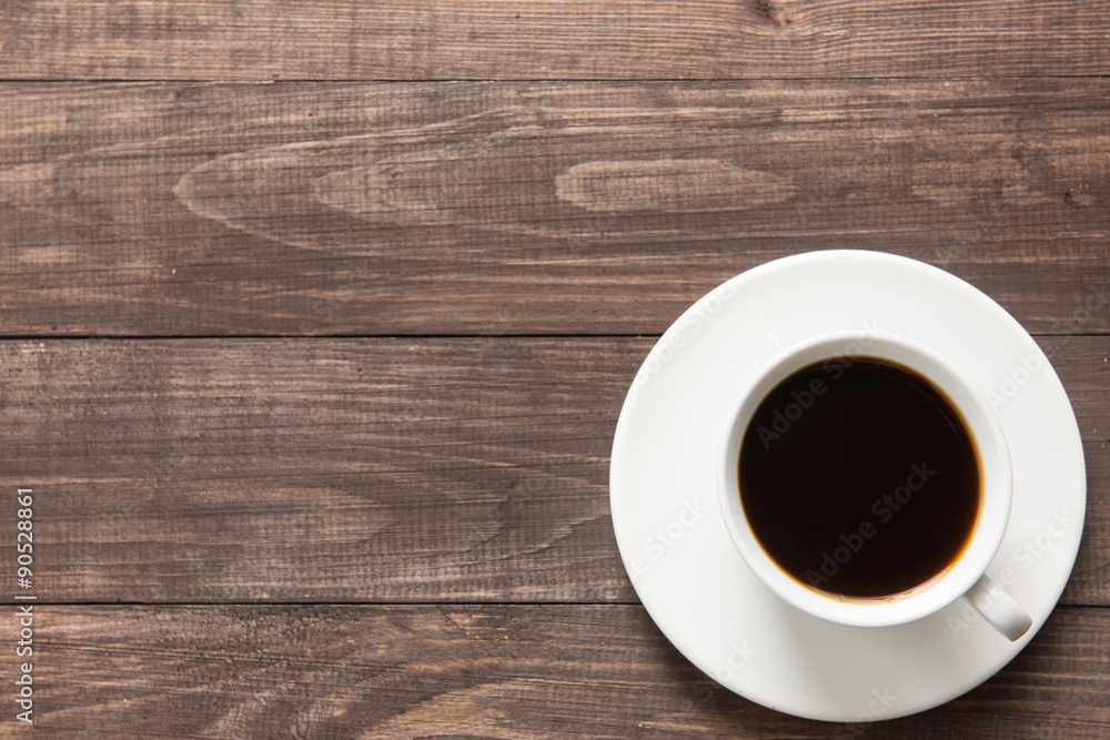 Coffee cup on wooden background. Top view Coffee cup on wooden background. Top view