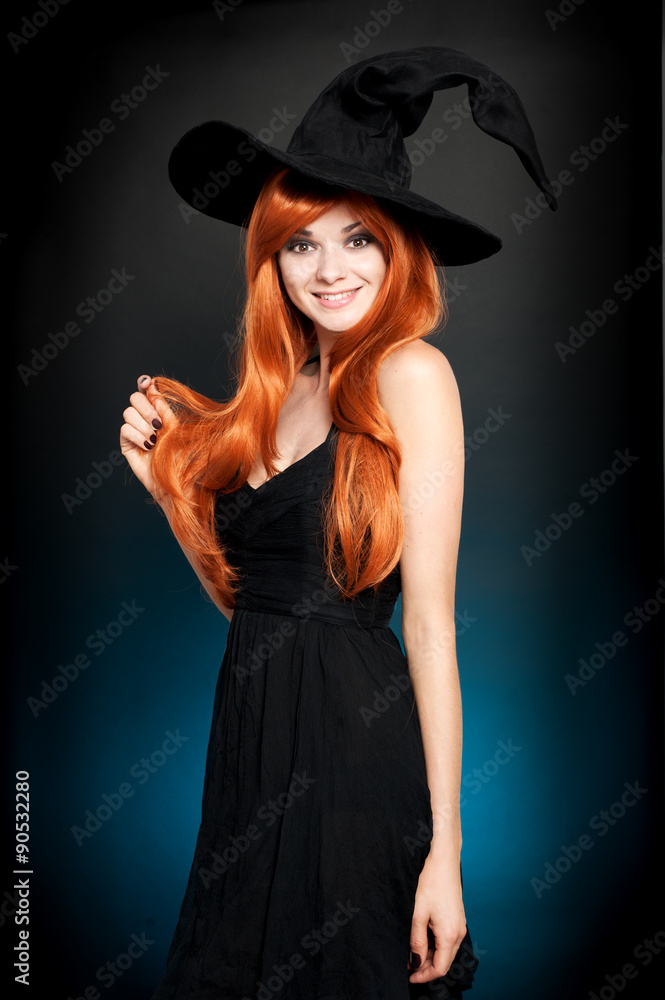 Beautiful young woman as halloween witch Beautiful young woman as halloween witch