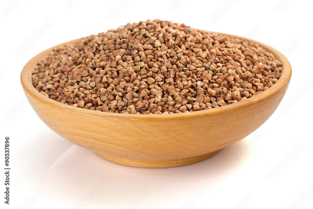 buckwheat in bowl isolated on white buckwheat in bowl isolated on white