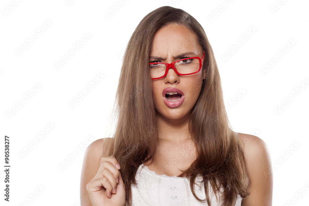 surprised beautiful girl with glasses posing on white surprised beautiful girl with glasses posing on white
