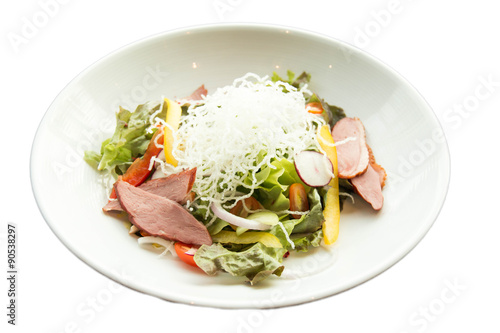  Salad with arugula and duck breast.