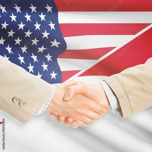 Businessmen handshake - United States and Monaco