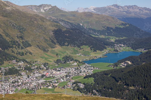 View From Mt. Jakobshorn Down To Davos & Lake Davos In Graubünden In Switzerland In Summer photo