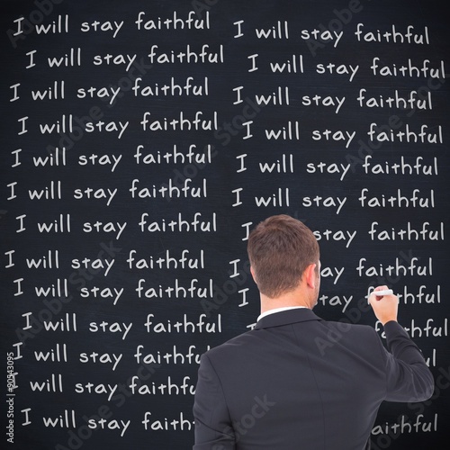 Composite image of business man writing with chalk