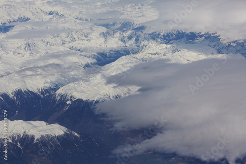 view from the the plane to the mountains © photoniko