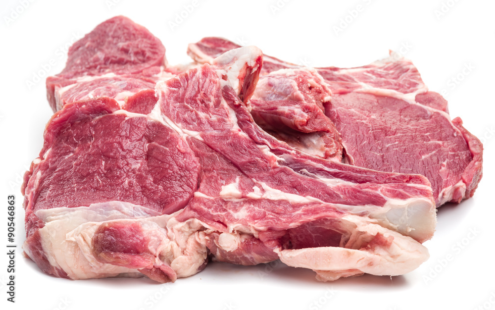 Raw beef steaks on a white background.