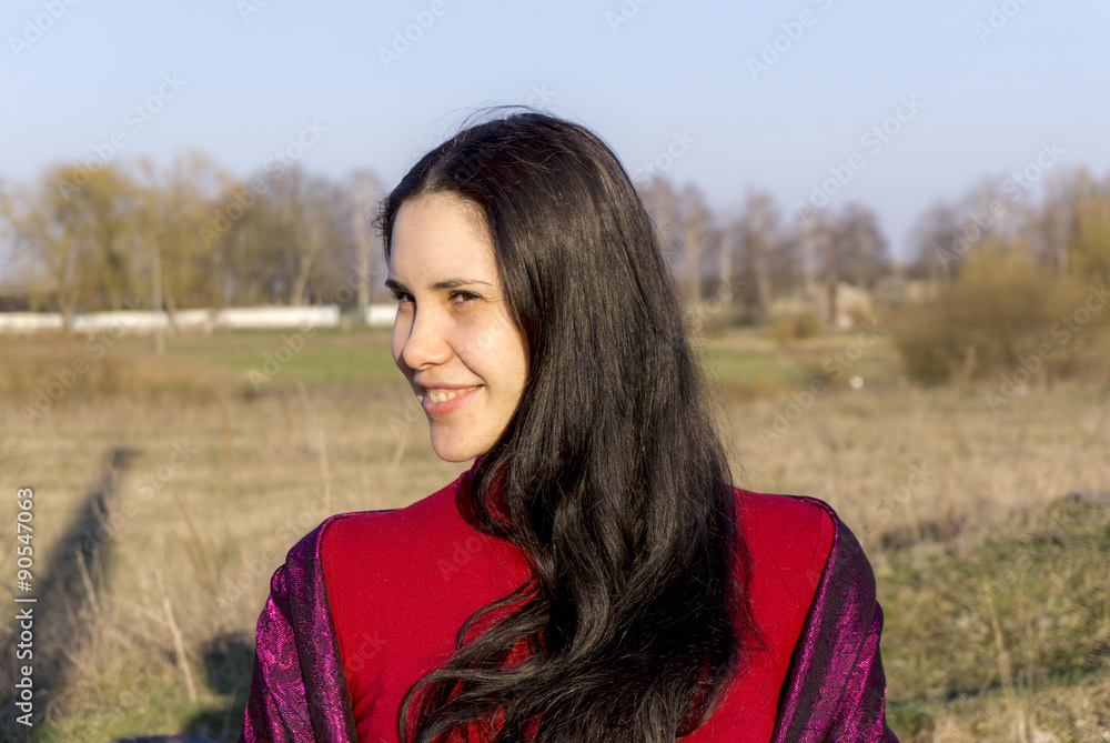 Portrait of young brunette girl in red jacket outdoor Portrait of young brunette girl in red jacket outdoor