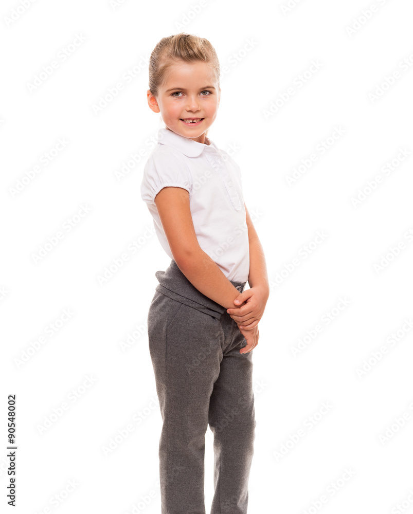 cheerful little girl wearing white t-shirt and pants isolated on cheerful little girl wearing white t-shirt and pants isolated on