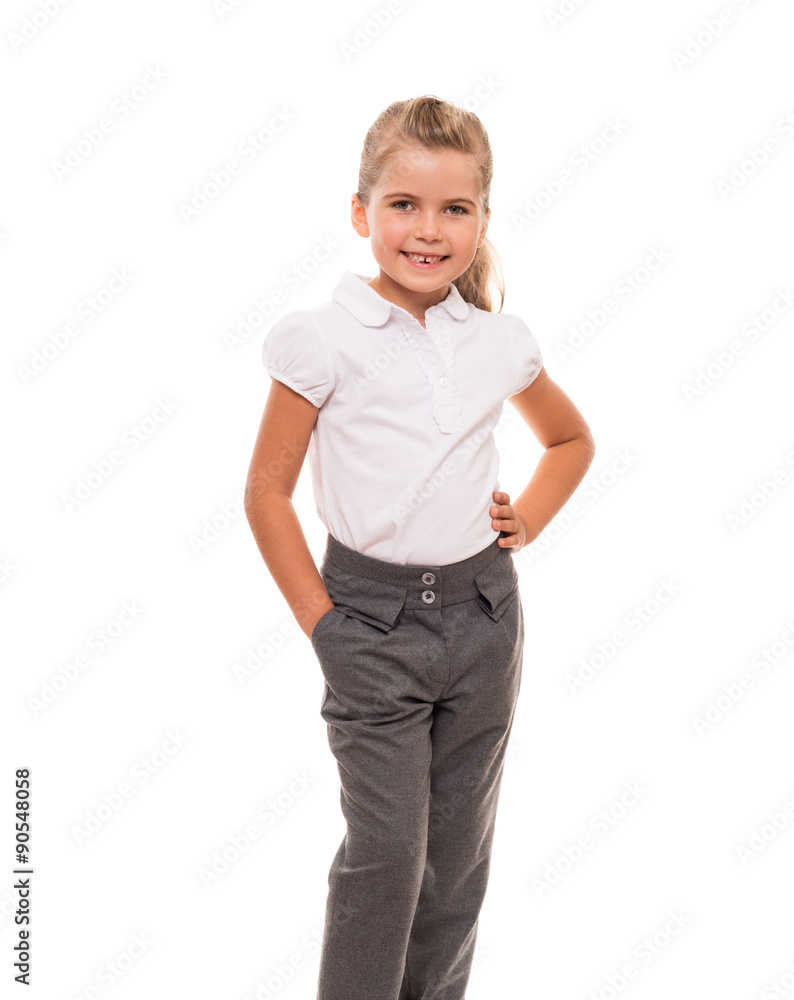cheerful little girl wearing white t-shirt and pants isolated on cheerful little girl wearing white t-shirt and pants isolated on