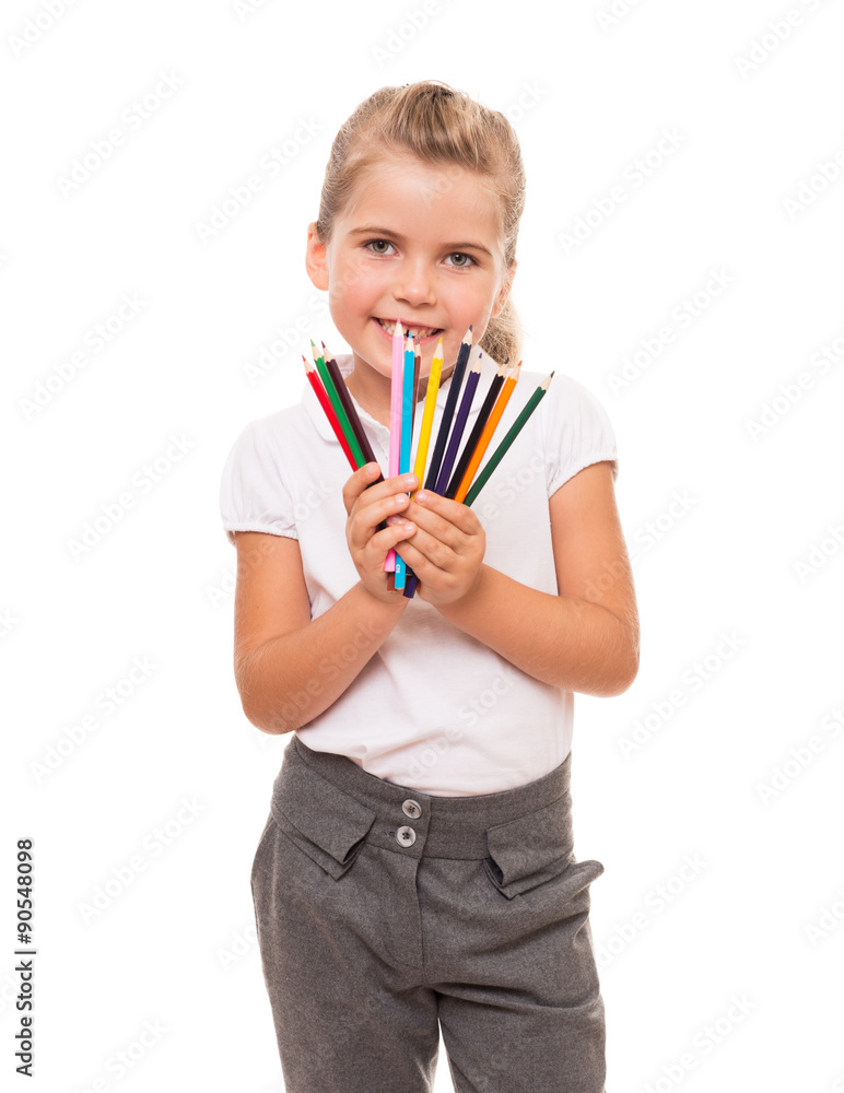 Little girl holding a few colorful pencils on white Little girl holding a few colorful pencils on white