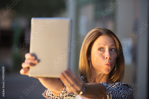 Lady Posing For Tablet