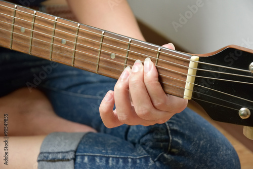 girl strum guitar example chords photo