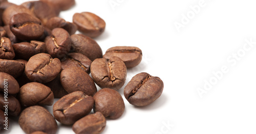 corner decoration of coffee beans on white background