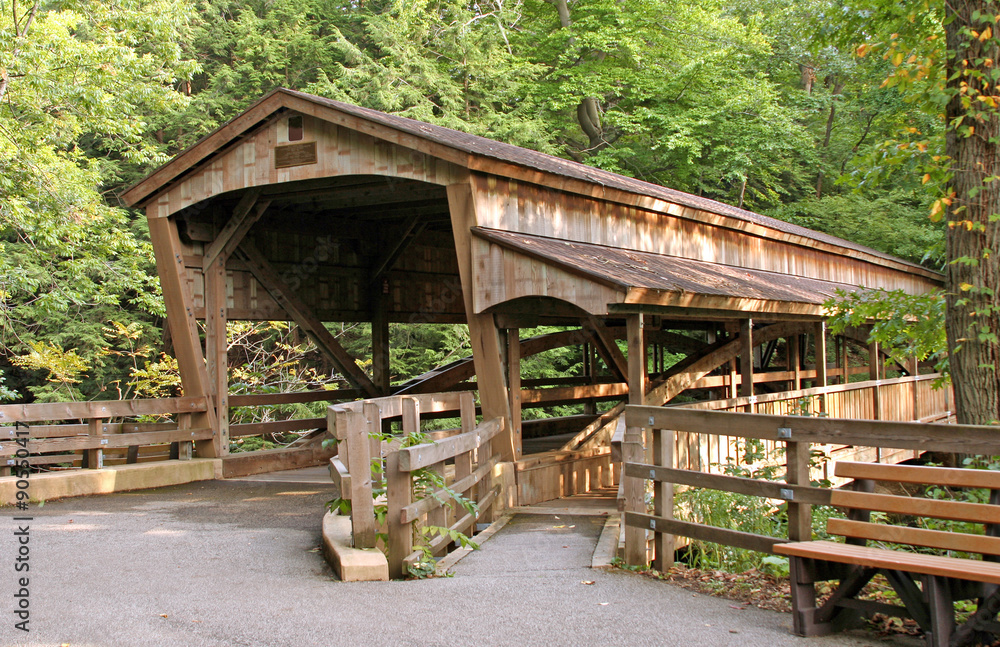 Covered Bridge – A wooden, old covered bridge in the country. Covered Bridge – A wooden, old covered bridge in the country.