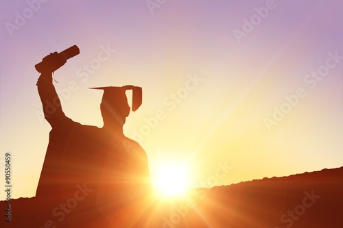 Composite image of silhouette of graduate photo