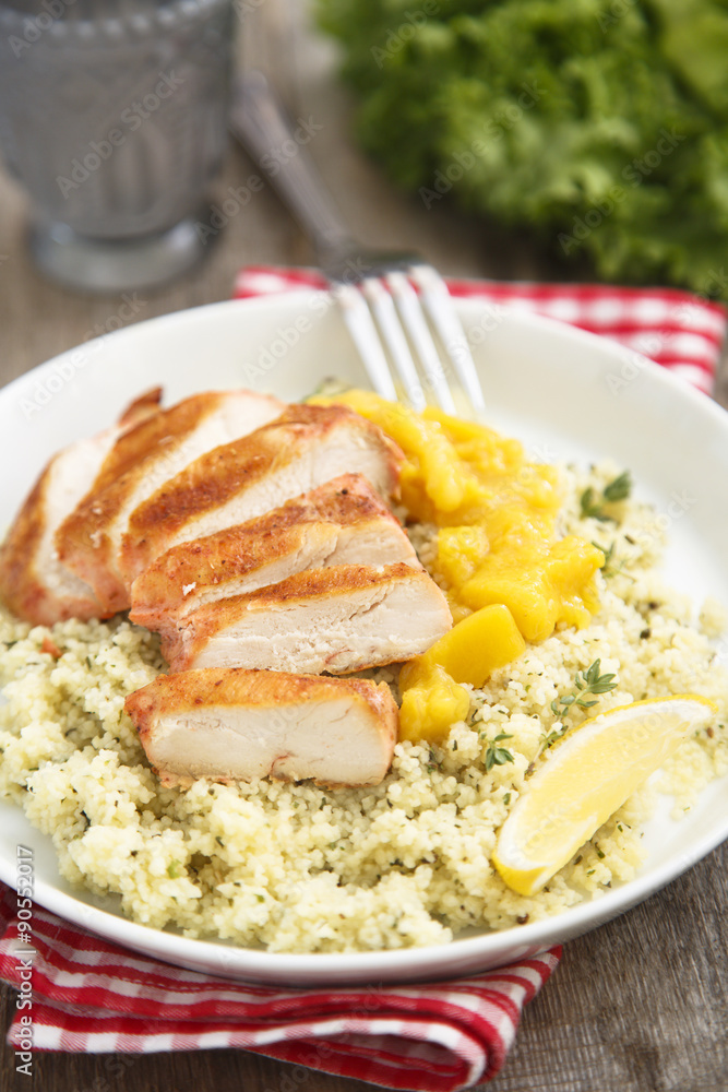 Grilled chicken with couscous and mango