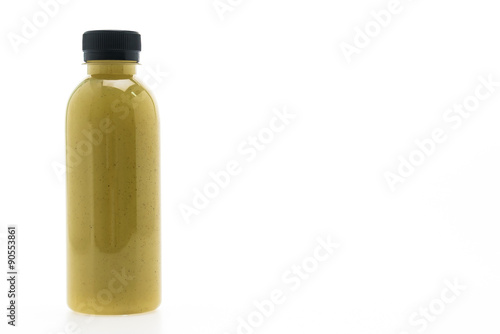Kiwi juice bottle isolated on white background