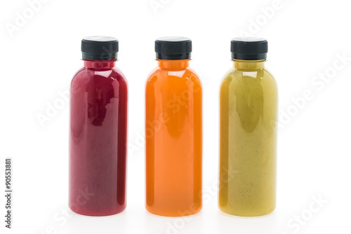 Fruit and vegetable juice bottles isolated on white background
