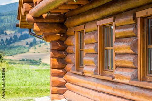 Quadro su tela cottage in the middle of mountain meadows
