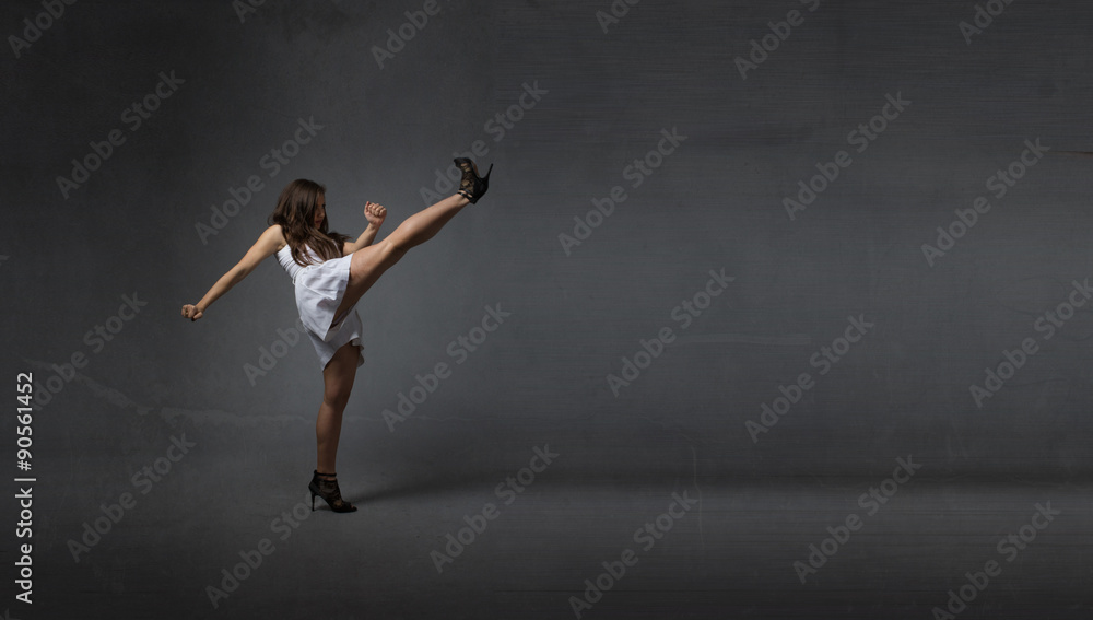 girl kicking empty space