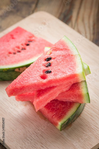 Pile of watermelon sliced.