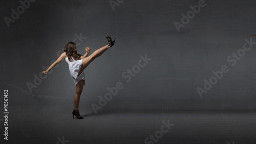 girl kicking empty space