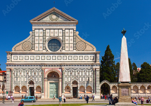 People are visiting Basilica Santa Maria Novella. Old religious landmark of Tuscany. Florence is one of most visited cities in Italy.