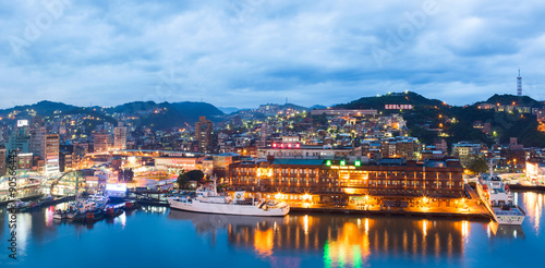 Night panoramic view of Keelung harbor with cruise terminal. Keelung city photo