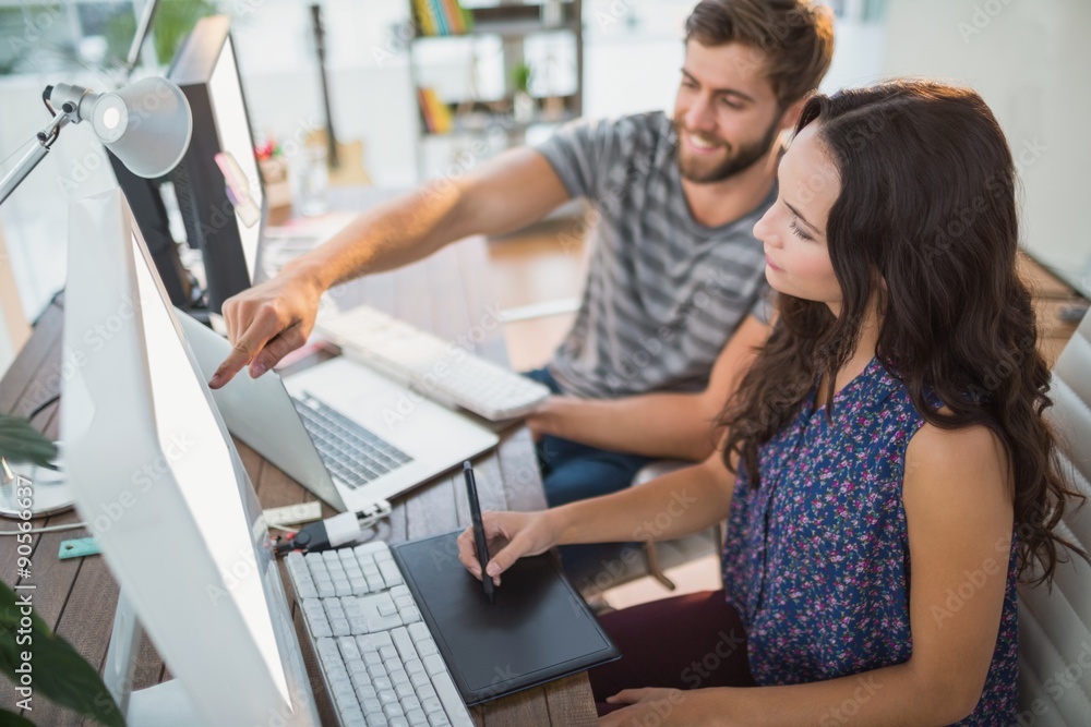 Smiling casual business team working together Smiling casual business team working together