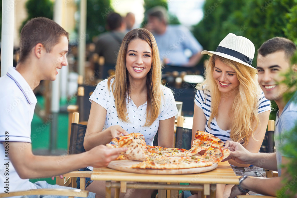 Friends enjoying pizza party Stock Photo by Rido81