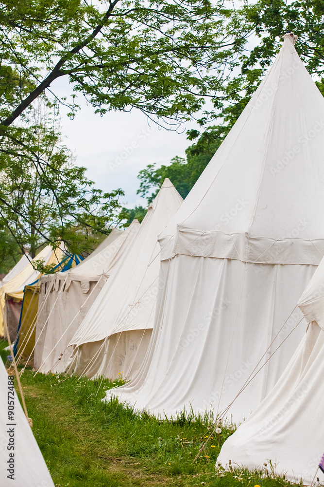 Knights camp with white tents