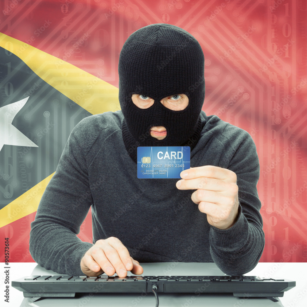 Concept of cybercrime with national flag on background - East Ti Concept of cybercrime with national flag on background - East Ti