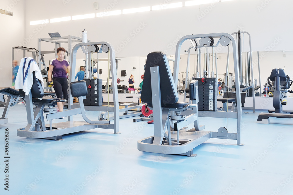 Fototapeta premium Interior of a fitness hall with fitness equipment