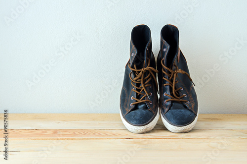 fashion shoes on wooden table