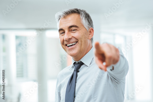 Bild auf Leinwand Businessman pointing at camera