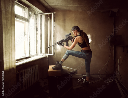Canvas Print woman sniper and Soldier aiming rifle at window