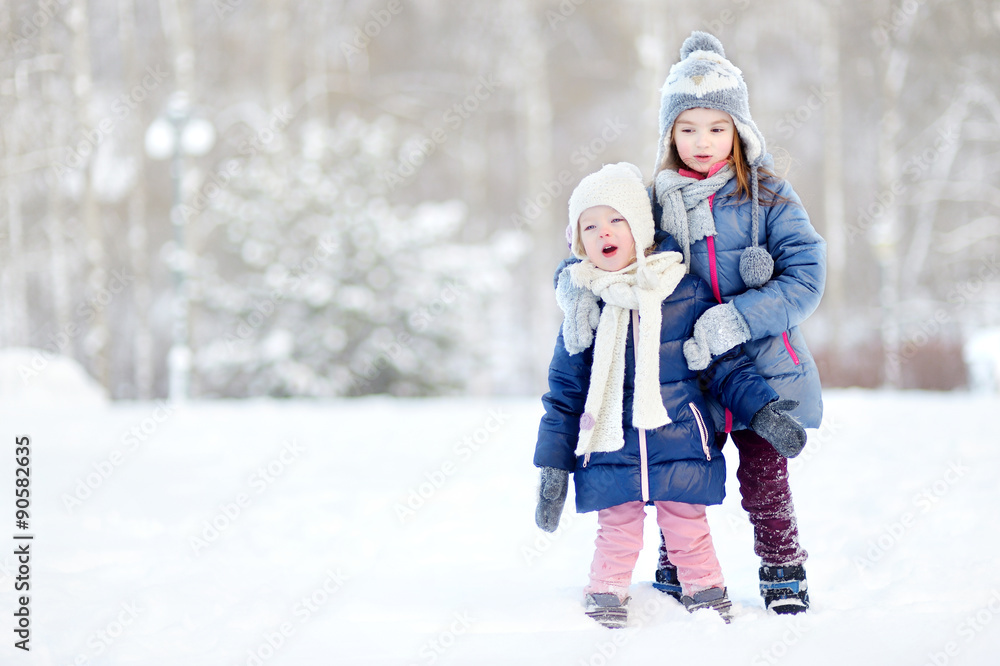 Two funny adorable little sisters winter park Two funny adorable little sisters winter park