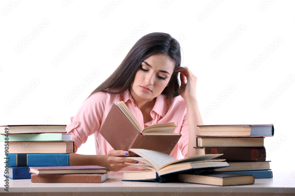 Young girl reading book isolated on white Young girl reading book isolated on white