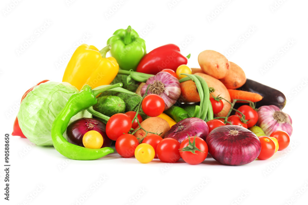 Heap of fresh vegetables isolated on white