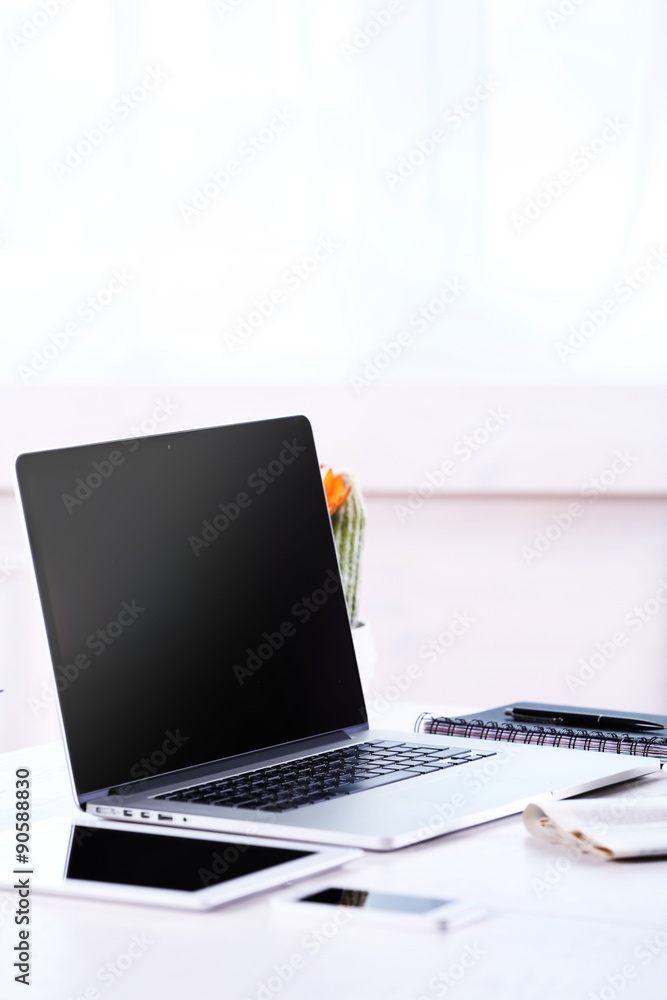 Modern workplace with laptop, close up Modern workplace with laptop, close up