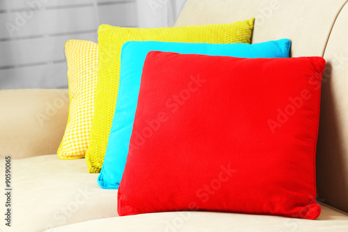 Valokuva Colorful pillows on sofa, close-up